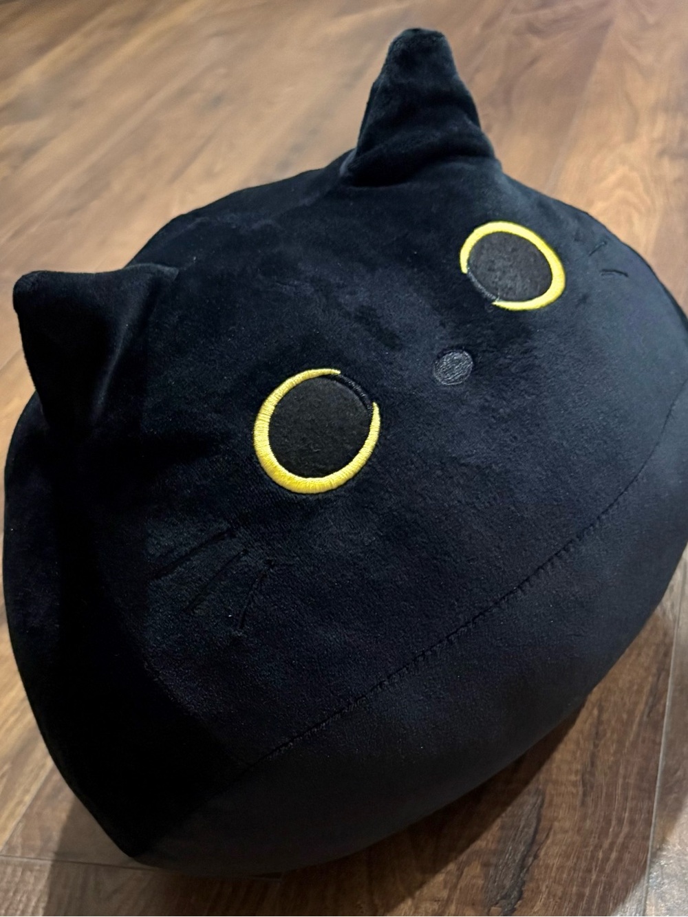 Black Plush Cat Pillow with Yellow Embroidered Eyes